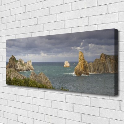 Canvas print Sea rocks landscape grey blue green