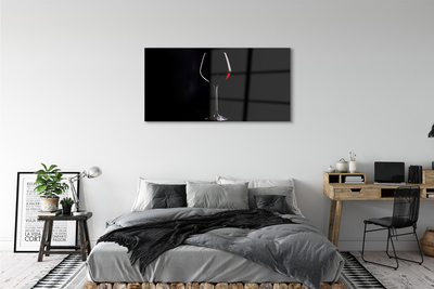 Glass print Black background with a glass of wine