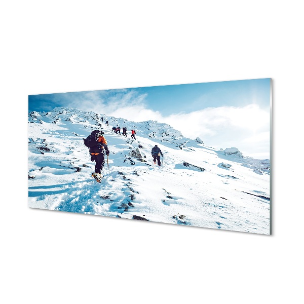 Glass print Climbing the mountains in winter