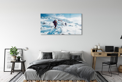 Glass print Climbing the mountains in winter