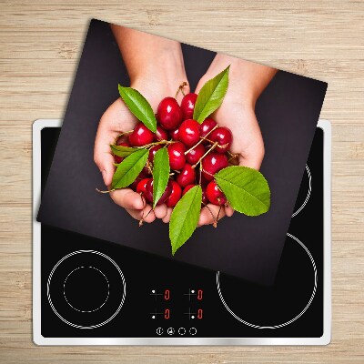 Chopping board Cherries in hands