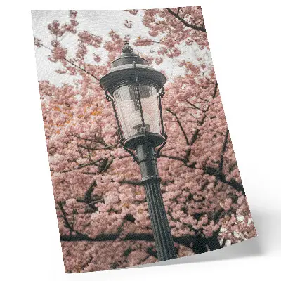 Decorative poster featuring pink trees and a black lantern with a nostalgic atmosphere