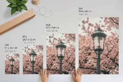 Decorative poster featuring pink trees and a black lantern with a nostalgic atmosphere