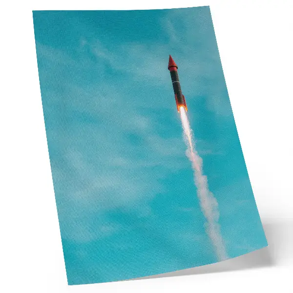 Decorative poster rocket rising into the blue sky