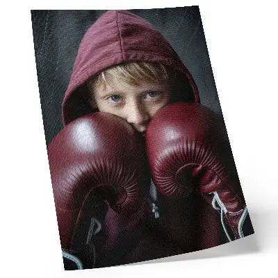 Decorative poster minimalist child in a burgundy sweatshirt and boxing gloves