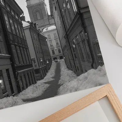 Poster a narrow street with a cathedral in the background
