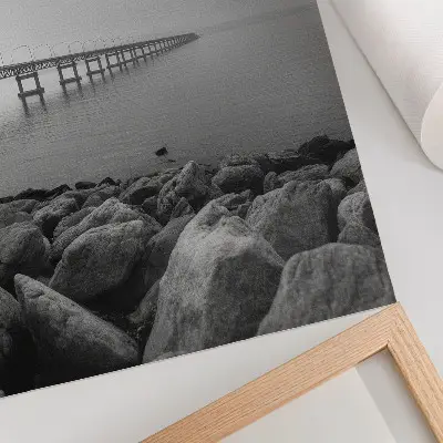 Premium wall art peaceful landscape featuring a bridge over a rocky beach under a gray sky