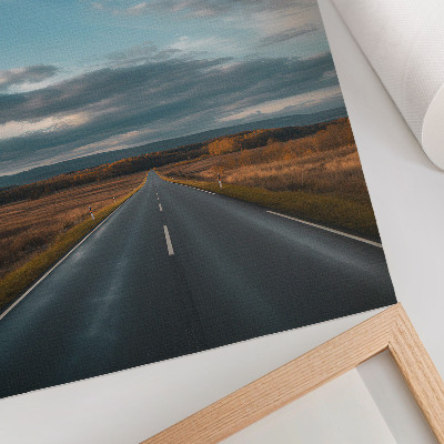 Decorative poster A road through the autumn plain under a blue sky