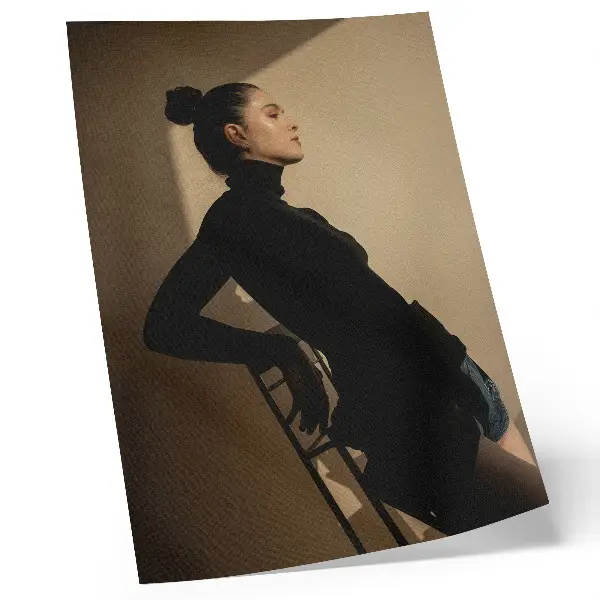 Poster dark silhouette of a woman with a ray of light symbolizing peace