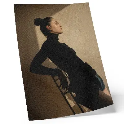 Poster dark silhouette of a woman with a ray of light symbolizing peace