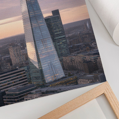 Premium wall art A skyscraper at sunset contrasting with the city