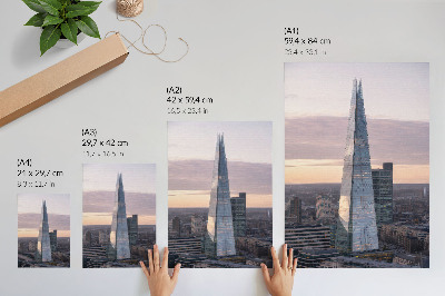 Premium wall art A skyscraper at sunset contrasting with the city