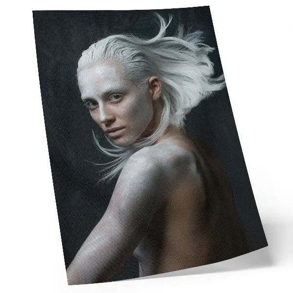 Decorative poster featuring a delicate white hair focus on a dark background