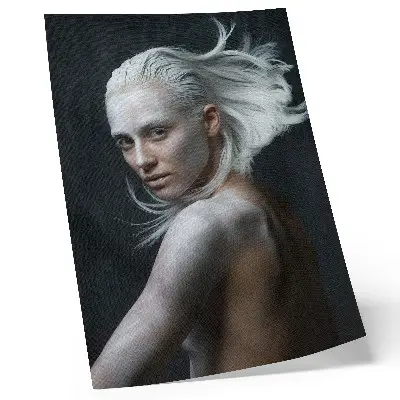 Decorative poster featuring a delicate white hair focus on a dark background