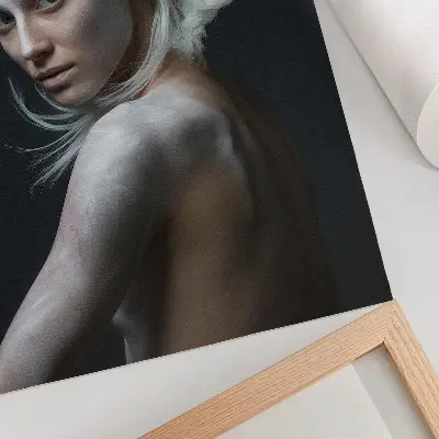 Decorative poster featuring a delicate white hair focus on a dark background