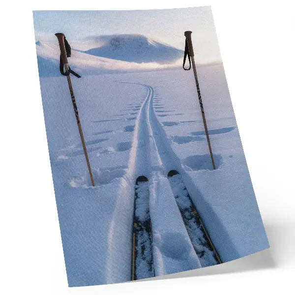 Poster white mountain silhouette against a snowy sky