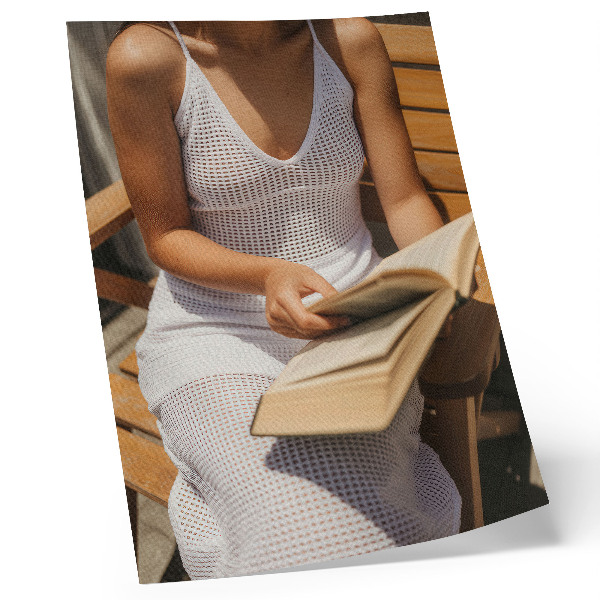 Premium wall art Woman with a book, wooden bench, sun