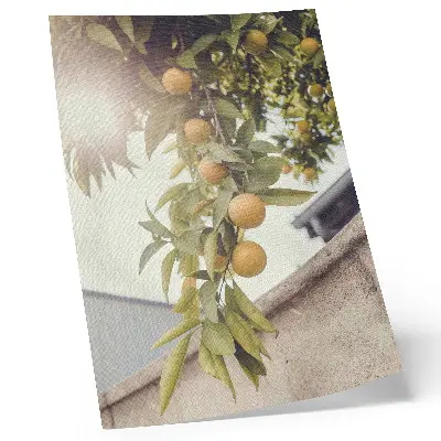 Decorative poster tree branch with sun and green leaves in orange tones