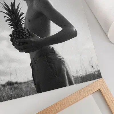 Poster monochrome figure wearing a hat in a pineapple field