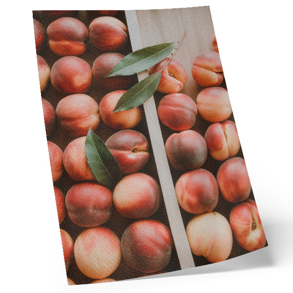 Poster Peaches with leaves in a wooden box