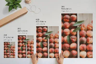 Peaches with leaves in a wooden box poster