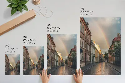 Poster colorful tenement houses with a rainbow against a cloudy sky