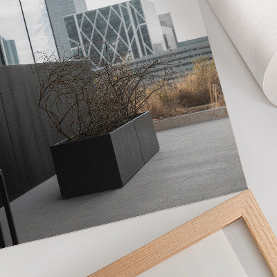 Decorative poster Modern buildings and dry branches