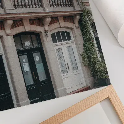 Poster flowers on the balcony with a brick facade in a classic style