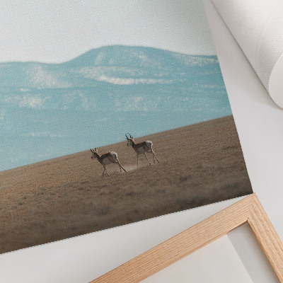 Premium wall art Antelopes against the backdrop of mountains, a peaceful space