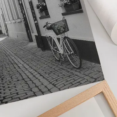Poster street view with tenement houses, flowers, and a bicycle in black and white