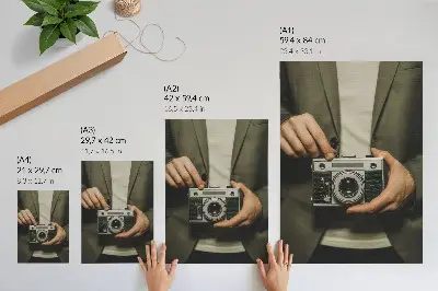 Poster retro camera hands in an elegant retro style
