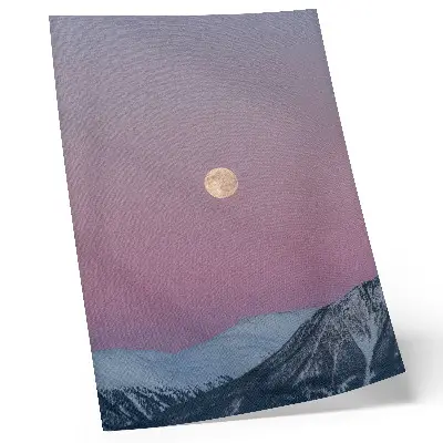 Decorative poster mountains at dusk with a moon in a pastel sky