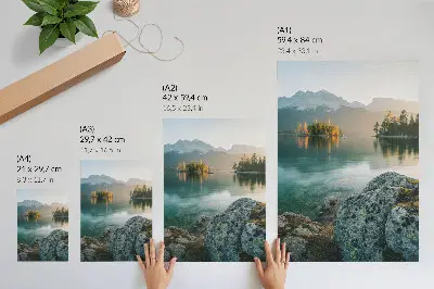 Poster mountains, lake, and island on a foggy morning