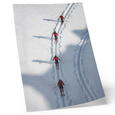 Decorative poster Skiers in the snow wearing red jackets