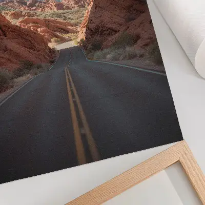 Art print road with rocky mountains under a blue sky