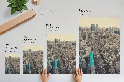 Decorative poster panorama of the city with tall buildings and a road
