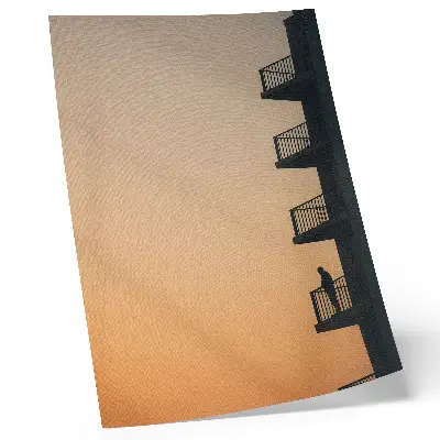 Premium wall art sunset silhouette of a building with a peaceful theme