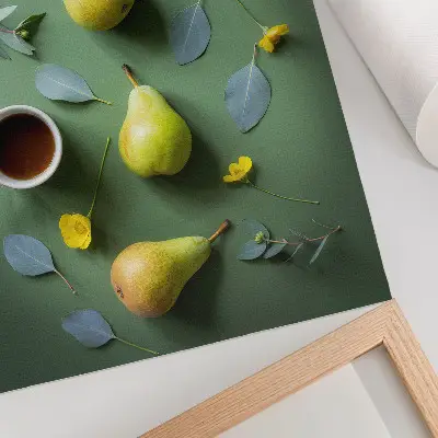 Art print featuring tea, pears, flowers, and leaves on a green background