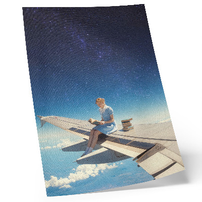 Decorative poster Girl on the wing of an airplane universe books