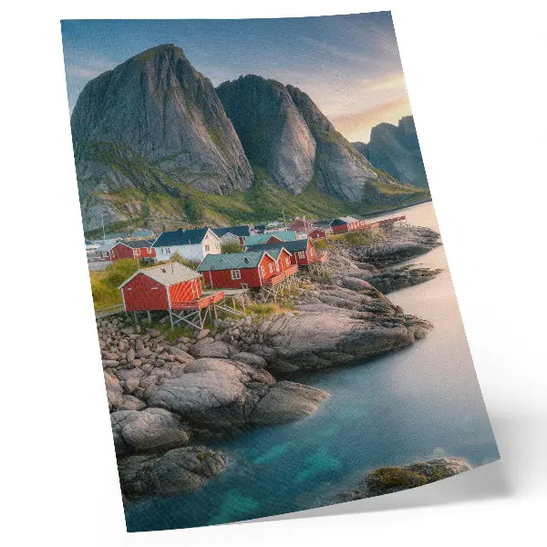 Decorative poster featuring charming cottages, a calm sea, and majestic mountains