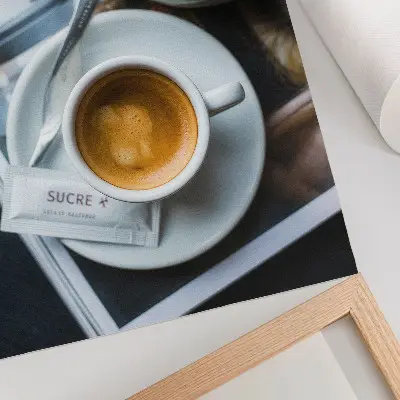 Decorative poster featuring a black and white coffee and croissant aesthetic for a relaxing atmosphere