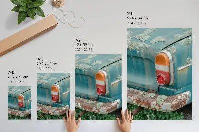 Decorative poster car covered in moss and rust in a turquoise color
