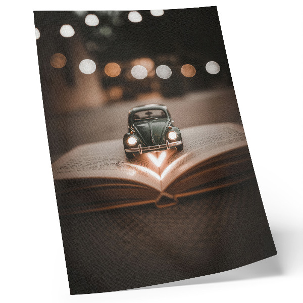 Art print Miniature car on a book with magic lights