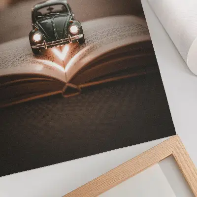 Miniature car on a book with magic lights art print
