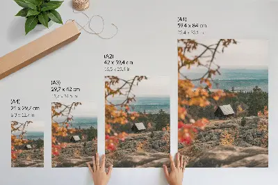 Decorative poster a house on a rock among trees in peaceful autumn nature