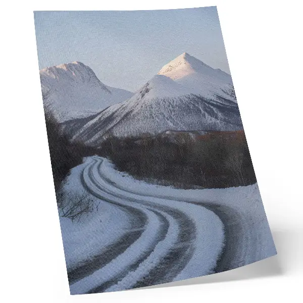 Poster winter landscape with curving mountain road