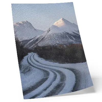 Poster winter landscape with curving mountain road