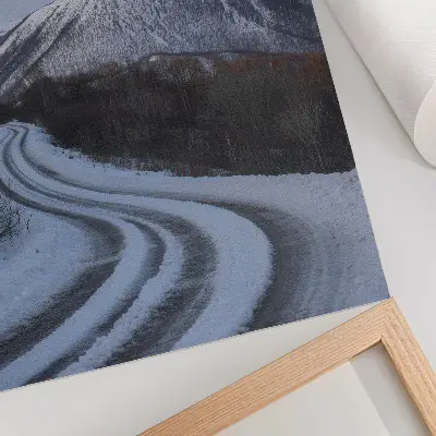 Poster winter landscape with curving mountain road