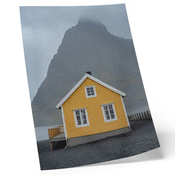Premium wall art minimalist yellow house in the mountains representing peace and simplicity