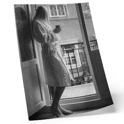 Premium wall art person at the window with a cup of coffee